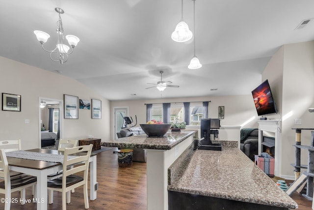 115 Joan Ct, New Bern, NC 28562 - kitchen featuring open floor plan, wood finished floors, ceiling fan, pendant lighting, and lofted ceiling