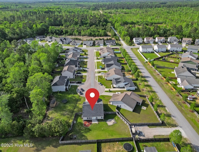 115 Joan Ct, New Bern, NC 28562 - aerial view of property and surrounding area featuring a heavily wooded area and nearby suburban area