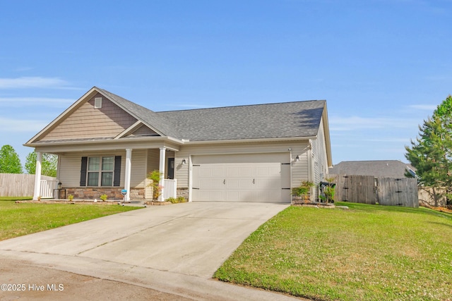 115 Joan Ct, New Bern, NC 28562 - view of front of home with covered porch, an attached garage, driveway, and a shingled roof