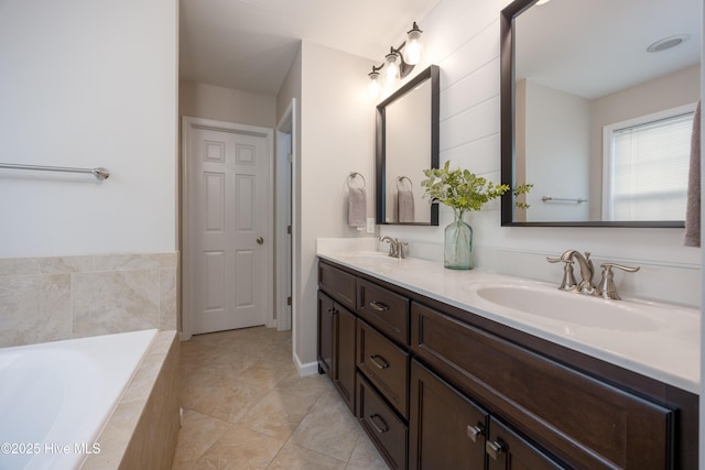 104 Northgate Ln, Clinton, NC 28328 - full bath featuring double vanity, a bath, and tile patterned flooring