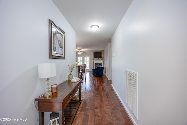 104 Northgate Ln, Clinton, NC 28328 - hall with dark wood-style floors and baseboards