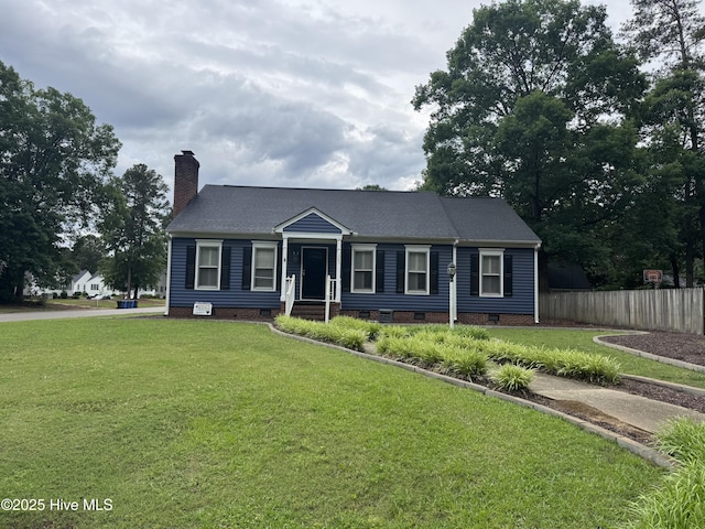 view of front of property featuring crawl space, a chimney, and a shingled roof