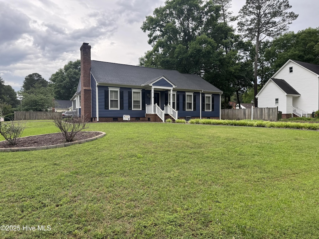 view of front of home with a chimney and crawl space