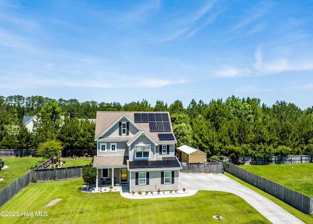 403 Stanford Ct, Maysville, NC 28555 - shingle-style home with driveway, roof mounted solar panels, a porch, and roof with shingles