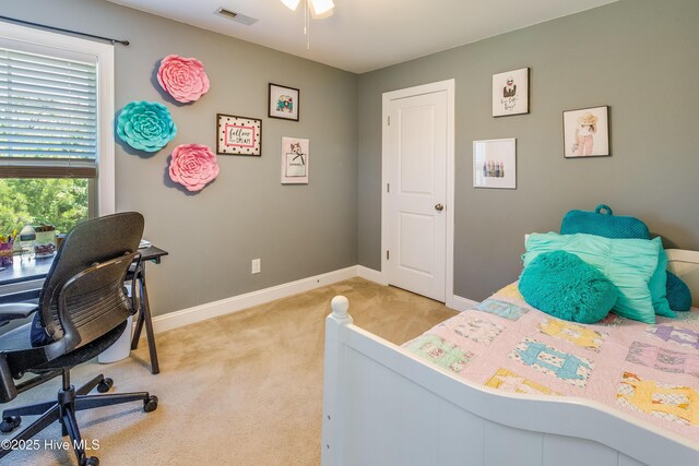 403 Stanford Ct, Maysville, NC 28555 - bedroom featuring light colored carpet, baseboards, and a desk