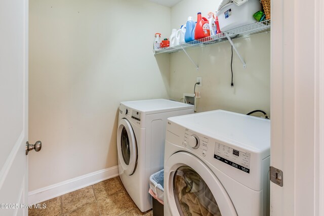 403 Stanford Ct, Maysville, NC 28555 - laundry room with independent washer and dryer, baseboards, and light tile patterned flooring