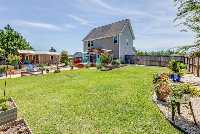 403 Stanford Ct, Maysville, NC 28555 - back of property featuring a garden, a gazebo, and cooling unit