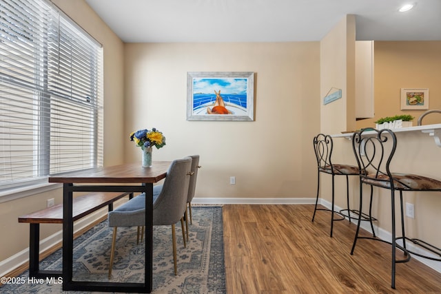 office area with wood finished floors, baseboards, plenty of natural light, and recessed lighting