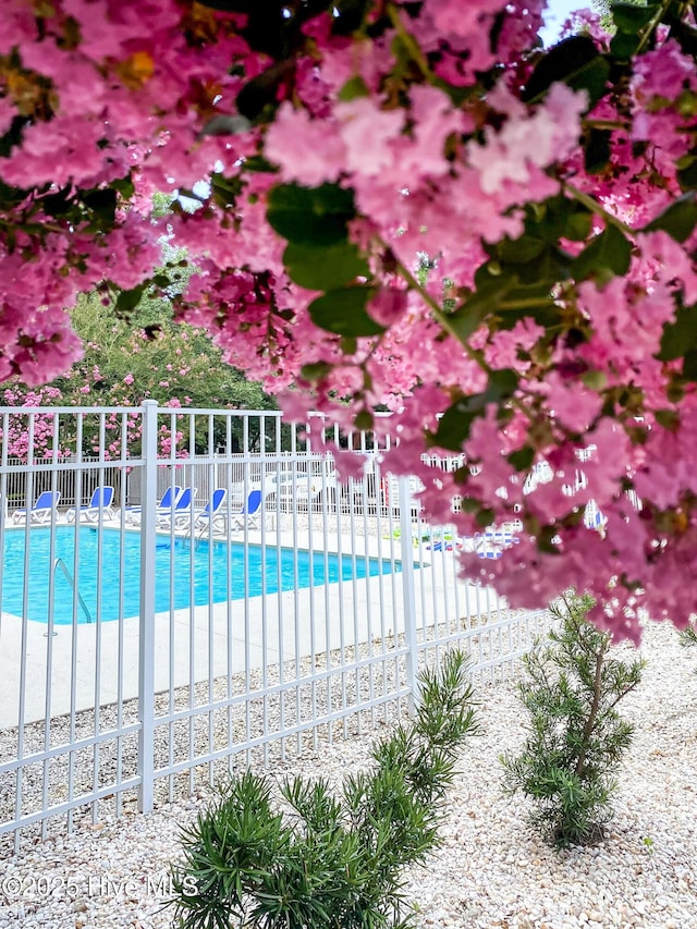 community pool with fence