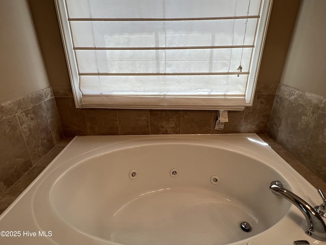 full bath with a jetted tub