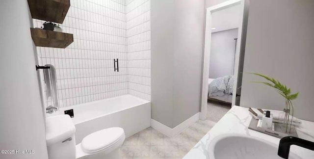 2112 Arnold Palmer Dr, Shallotte, NC 28470 - full bathroom featuring marble look tile flooring, toilet, washtub / shower combination, ensuite bath, and baseboards