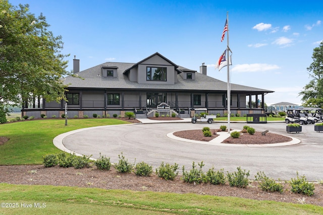 2112 Arnold Palmer Dr, Shallotte, NC 28470 - view of building exterior featuring curved driveway
