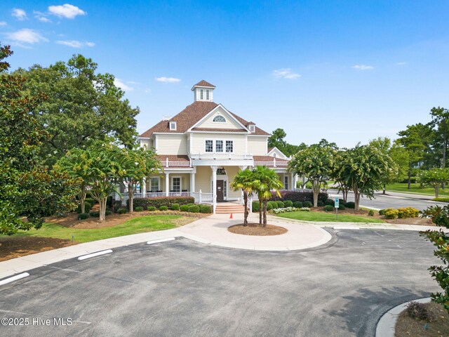 2112 Arnold Palmer Dr, Shallotte, NC 28470 - view of building exterior featuring uncovered parking