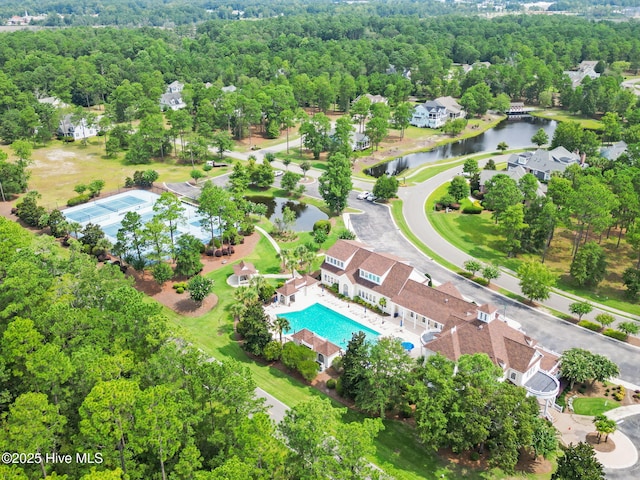 2112 Arnold Palmer Dr, Shallotte, NC 28470 - bird's eye view of a nearby body of water, a pool, and a forest