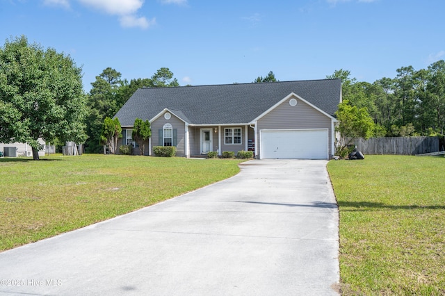 ranch-style home with driveway and an attached garage