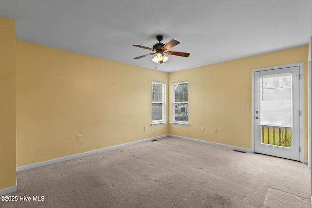 149 Lee St, Holly Ridge, NC 28445 - carpeted empty room with ceiling fan and baseboards