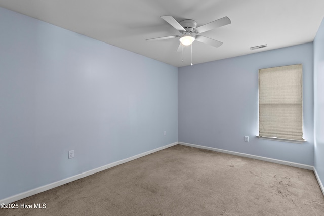 149 Lee St, Holly Ridge, NC 28445 - carpeted empty room with ceiling fan and baseboards