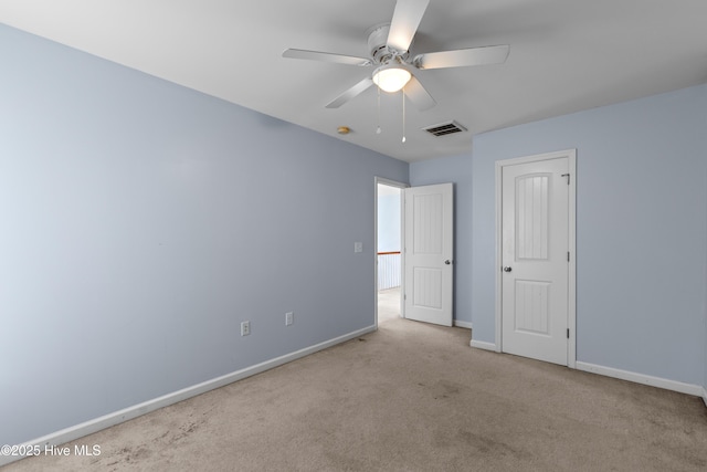 149 Lee St, Holly Ridge, NC 28445 - unfurnished bedroom featuring carpet flooring, baseboards, and ceiling fan