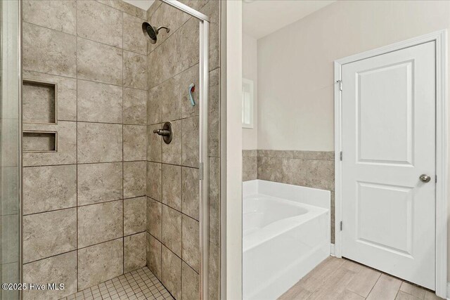11 Bedford Cir, Pinehurst, NC 28374 - full bathroom featuring a shower stall and a bath