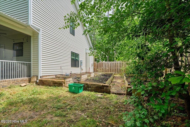11 Bedford Cir, Pinehurst, NC 28374 - view of yard with a garden and fence