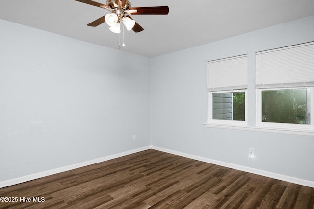 2414 Educational Dr, New Bern, NC 28562 - empty room featuring dark wood finished floors, baseboards, and ceiling fan