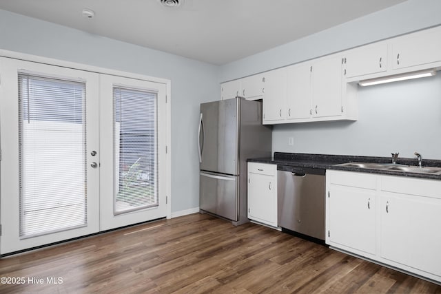 2414 Educational Dr, New Bern, NC 28562 - kitchen featuring a sink, appliances with stainless steel finishes, french doors, and dark wood-type flooring