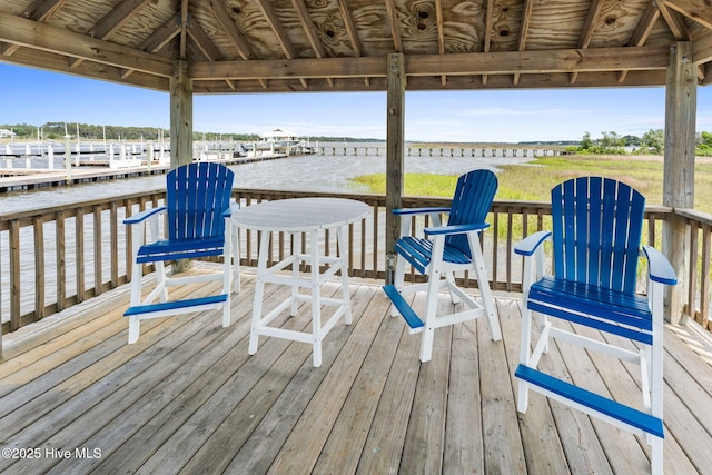 114 Lucas Cv, Oak Island, NC 28465 - wooden deck with a water view and a gazebo