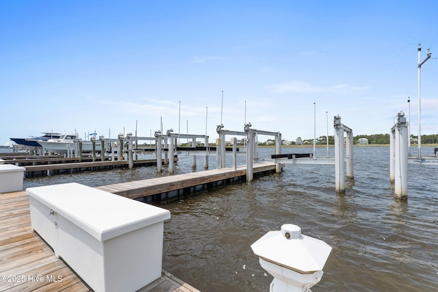 114 Lucas Cv, Oak Island, NC 28465 - dock area with boat lift and a water view
