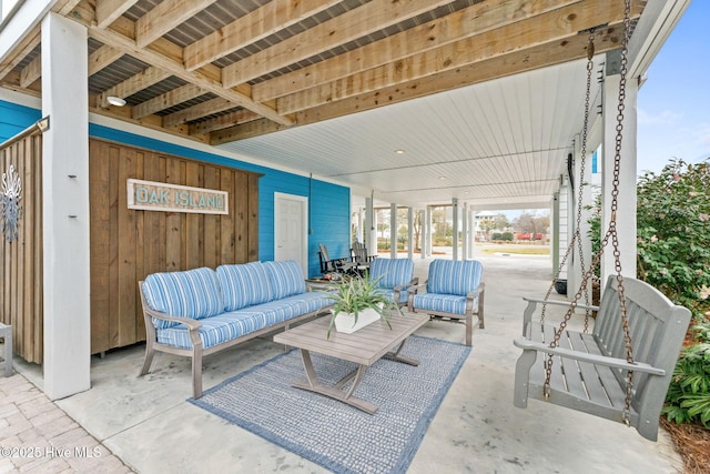 114 Lucas Cv, Oak Island, NC 28465 - view of patio featuring an outdoor living space