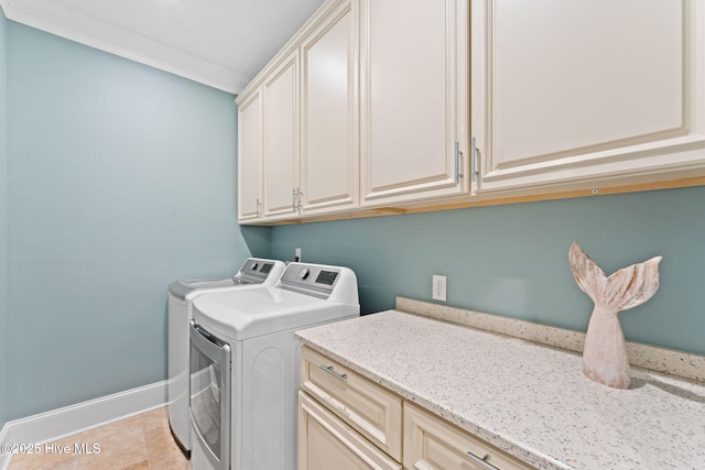 114 Lucas Cv, Oak Island, NC 28465 - washroom with cabinet space, washing machine and dryer, baseboards, and crown molding