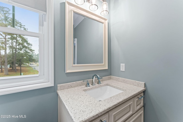 114 Lucas Cv, Oak Island, NC 28465 - bathroom featuring vanity and healthy amount of natural light