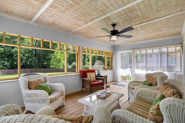 sunroom / solarium with a ceiling fan and outdoor lounge area