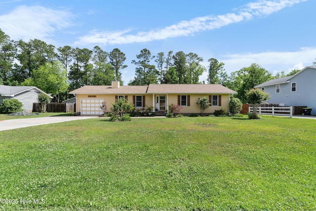 single story home with concrete driveway, a garage, and a chimney