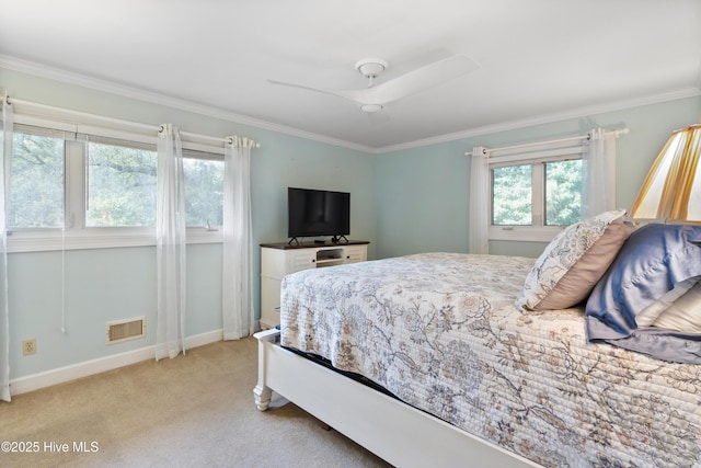 221 Quail Ridge Rd, Wilmington, NC 28409 - bedroom with ornamental molding, light carpet, baseboards, and ceiling fan