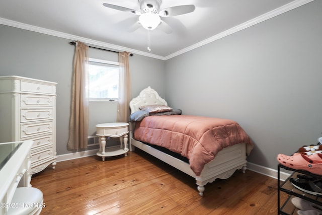 221 Quail Ridge Rd, Wilmington, NC 28409 - bedroom with crown molding, light wood-type flooring, baseboards, and a ceiling fan