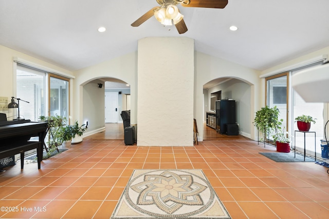 221 Quail Ridge Rd, Wilmington, NC 28409 - living area with lofted ceiling, a ceiling fan, light tile patterned floors, baseboards, and recessed lighting