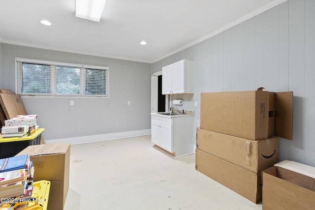221 Quail Ridge Rd, Wilmington, NC 28409 - below grade area featuring a sink, ornamental molding, and recessed lighting