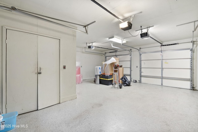 221 Quail Ridge Rd, Wilmington, NC 28409 - garage featuring a garage door opener