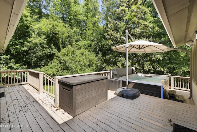 221 Quail Ridge Rd, Wilmington, NC 28409 - wooden terrace featuring a hot tub and view of scattered trees