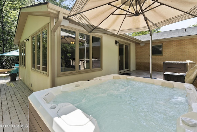 221 Quail Ridge Rd, Wilmington, NC 28409 - wooden terrace featuring a hot tub