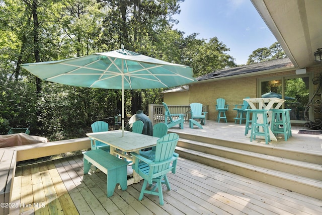 221 Quail Ridge Rd, Wilmington, NC 28409 - wooden terrace with outdoor dining space