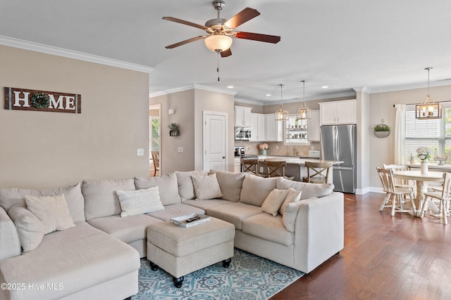 433 Landsdowne Cir, Hampstead, NC 28443 - living room with ceiling fan, recessed lighting, dark wood-type flooring, ornamental molding, and baseboards