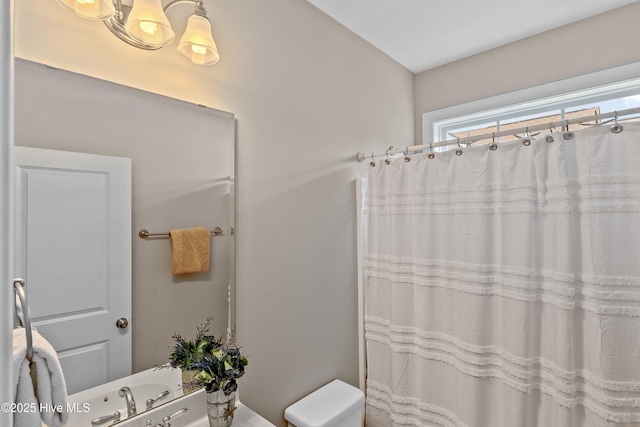 433 Landsdowne Cir, Hampstead, NC 28443 - bathroom featuring toilet and a shower with curtain