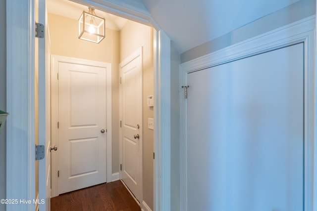 433 Landsdowne Cir, Hampstead, NC 28443 - hallway with dark wood-style flooring
