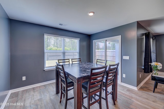 1145 Saint Augustine Dr, Castle Hayne, NC 28429 - dining space with light wood-type flooring and baseboards