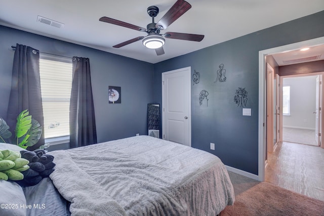 1145 Saint Augustine Dr, Castle Hayne, NC 28429 - carpeted bedroom featuring baseboards and ceiling fan