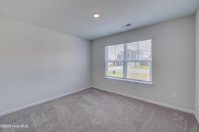 1145 Saint Augustine Dr, Castle Hayne, NC 28429 - empty room featuring baseboards and carpet flooring