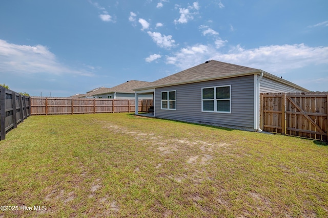 1145 Saint Augustine Dr, Castle Hayne, NC 28429 - rear view of house with a shingled roof
