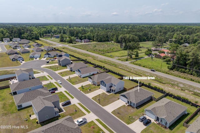 1145 Saint Augustine Dr, Castle Hayne, NC 28429 - aerial view of residential area with a forest