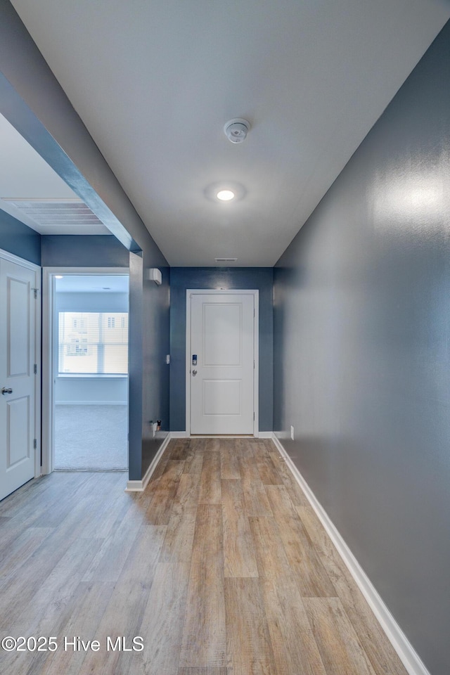 1145 Saint Augustine Dr, Castle Hayne, NC 28429 - hallway with wood finished floors and baseboards